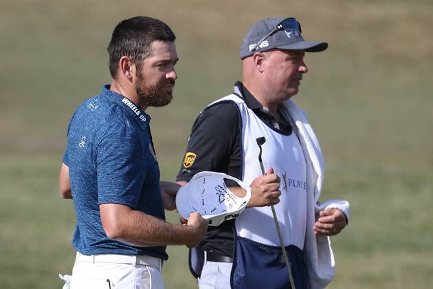 May 12, 2017 - Ponte Vedra Beach, Florida, United States - Louis Oosthuizen (L) and his caddie Greg Hearmon on the 9th green after the second round of The PLAYERS Championship at TPC Sawgrass. Golf 2017: The PLAYERS Championship - Round 2 - ZUMAw109 20170512_zap_w109_073 Copyright: xDebbyxWongx
