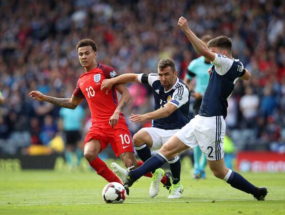 Scotland s James Morrison tussles with England s Dele Alli during the FIFA World Cup WM Weltmeisterschaft Fussball Qualifying match at Hampden Park Stadium, Glasgow Picture date 10th June 2017. Picture credit should read: David Klein Sportimage EDITORIAL USE ONLY. No use with unauthorised audio, video, data, fixture lists, club league logos or live services. Online in-match use limited to 120 images, no video emulation. No use in betting, games or single club league player publications.