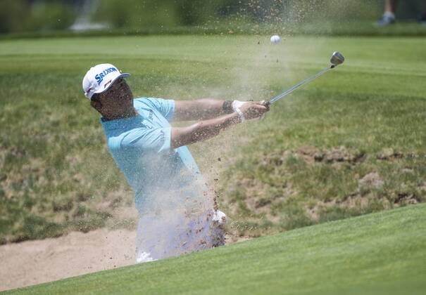 Hideki Matsuyama hits out of a bunker on the 8th fairway during round 1 of the 117th U.S. Open golf tournament at Erin Hill golf course in Erin, Wisconsin on June 15, 2017.  WIS20170615336 KEVINxDIETSCH
