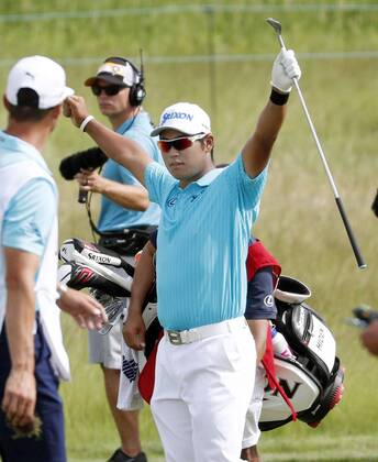 Golf: Matsuyama at U.S. Open 1st round Japan s Hideki Matsuyama acknowledges the crowd after making an eagle on the 15th hole during the first round of the U.S. Open Championship at Erin Hills in Erin, Wisconsin, on June 15, 2017. After shooting a 2-over 74, Matsuyama sat in a tie for 82nd place. 