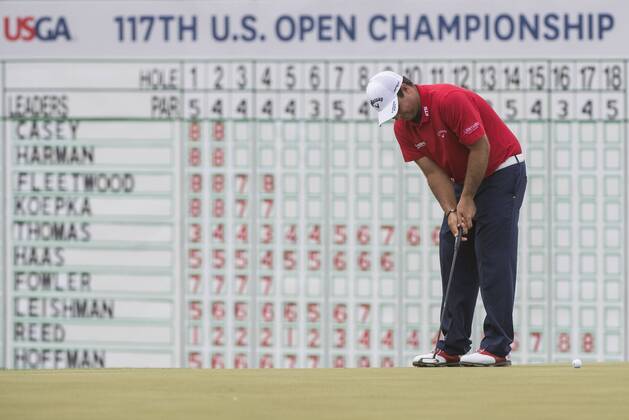 Patrick Reed putt on the 18th green during round 3 of the 117th U.S. Open golf tournament at Erin Hill golf course on June 17, 2017 in Erin, Wisconsin.  WIS20170617303 KEVINxDIETSCH