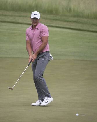 Brooks Koepka reacts to a missed putt on the 11th green during round 3 of the 117th U.S. Open golf tournament at Erin Hill golf course on June 17, 2017 in Erin, Wisconsin.  WIS20170617331 KEVINxDIETSCH