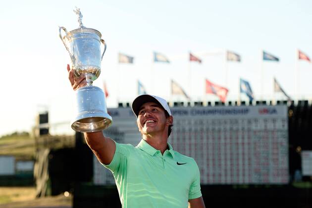 Brooks Koepka poses with the U.S. Open Trophy after the final round of the 117th U.S. Open golf tournament at Erin Hills golf course on June 18, 2017 in Erin, Wisconsin. Koepka shot a 16-under-par 272 to win the tournament by 4 strokes.  WIS20170618101 BRIANxKERSEY