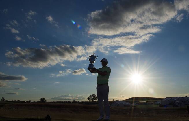 Brooks Koepka poses with the trophy after winning the 117th U.S. Open golf tournament at Erin Hills golf course on June 18, 2017, in Erin, Wisconsin. Koepka posted a final score of 16-under-par.  WIS20170618313 KEVINxDIETSCH