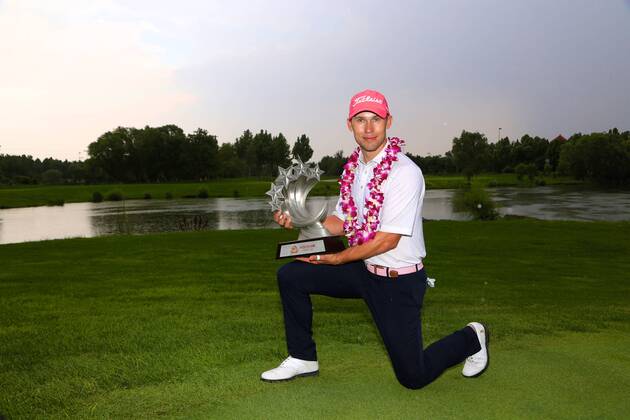 Bryden Macpherson of Australia poses with his trophy after winning the final round of 2017 the Fragrant Hills International Beijing Open golf tournament in Beijing, China, 25 June 2017. Australian golfer Bryden Macpherson ranked the top on the China Tour Order of Merit this week when the second event of the newly formed circuit s 2017 season gets underway in Beijing. The Tour recently cut ties with the PGA Golf Herren TOUR and is now run by the China Golf Association with ties to both the European and Asian Tours. The Fragrant Hills International Beijing Open, which is the second stop on the China Tour, is set to welcome 141 players from 17 countries when it tees off from June 22-25. Bryden Macpherson titles Fragrant Hills International Beijing Open  20170625_82722