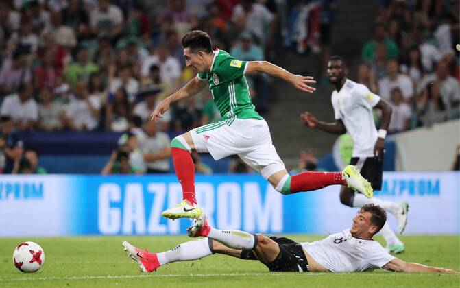 SOCHI, RUSSIA - JUNE 29, 2017: Mexico s Hector Herrera (L) and Germany s Leon Goretzka fight for the ball in their 2017 FIFA Confederations Cup semifinal football match at Fisht Stadium. Artyom Korotayev TASS  TS0557CA