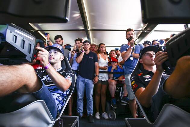 FORMULA 1 - GP of Austria 2017 SPIELBERG,AUSTRIA,07.JUL.17 - MOTORSPORTS, FORMULA 1 - Grand Prix of Austria, Red Bull Ring, free practice. Image shows Max Verstappen (NED Red Bull Racing) and Red Bull eGamer hakkiJunior Erik Lestach. GEPAxpictures xFelixxRoittner