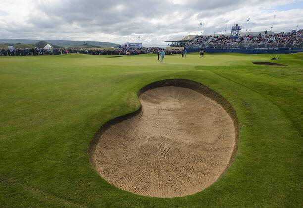 July 7th 2017, Portstewart Golf Club, Portstewart, Northern Ireland; Dubai Duty Free Irish Open Golf Championship, Day 2; Justin Rose (ENG) and Tommy Fleetwood (ENG) on the 18th green in front of the main stand during the second round of the Dubai Duty Free Irish Open xNigelxCookex  ActionPlus11898844