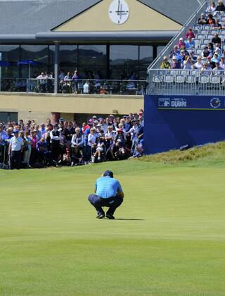 July 8th 2017, Portstewart Golf Club, Portstewart, Northern Ireland; Dubai Duty Free Irish Open Golf Championship, Day 3; Padraig Harrington (IRL) lines up his putt on the 18th green in front of the grandstand during the third round of the Dubai Duty Free Irish Open xNigelxCookex  ActionPlus11898995
