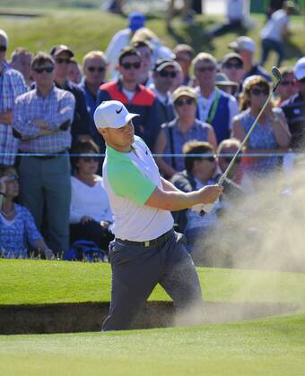 July 8th 2017, Portstewart Golf Club, Portstewart, Northern Ireland; Dubai Duty Free Irish Open Golf Championship, Day 3; Oliver Fisher (ENG) chips out of the 18th green bunker during the third round of the Dubai Duty Free Irish Open xNigelxCookex  ActionPlus11899102