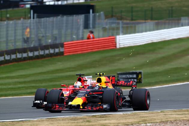 British Grand Prix, Silverstone 13 - 16 July 2017 16.07.2017 - Race, Sebastian Vettel (GER) Scuderia Ferrari SF70H and Max Verstappen (NED) Red Bull Racing RB13