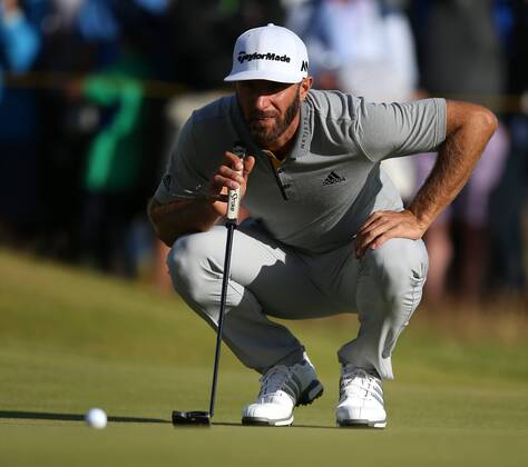 20th July 2017, Royal Birkdale Golf Club, Southport, England; The 146th Open Golf Championship, First round; Dustin Johnson (USA) studies his birdie putt on the 15th green xDavidxBlunsdenx  ActionPlus11904128