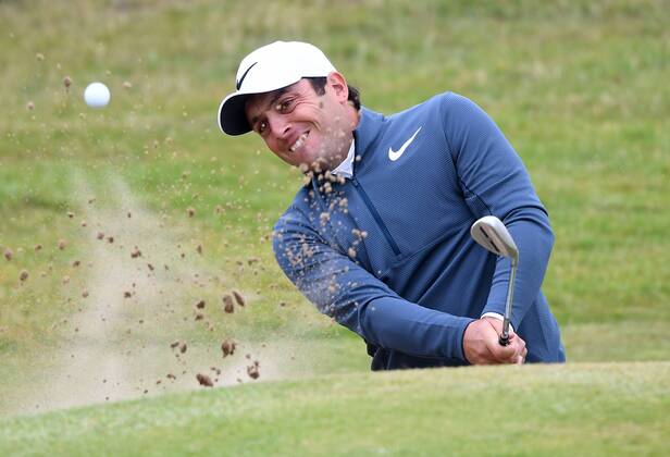 Italy s Francesco Molinari hits out of the bunker green on the 7th green on Day two at the 146th Open Championship, Southport on July 21, 2017.  LON2017072119 HUGOxPHILPOTT