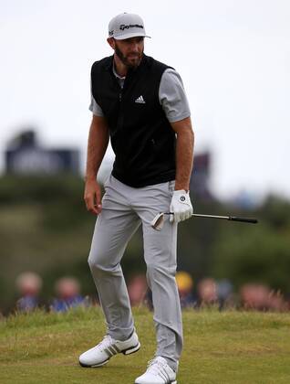 21st July 2017, Royal Birkdale Golf Club, Southport, England; The 146th Open Golf Championship, second round; Dustin Johnson (USA) takes a look at the contours around the ninth green after hitting his approach into the gorse xDavidxBlunsdenx  ActionPlus11904443