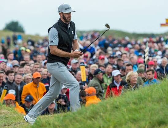 21st July 2017, Royal Birkdale Golf Club, Southport, England; The 146th Open Golf Championship, second round; Dustin Johnson (USA) looks at the contours around the 9th green after hitting his approach shot into gorse xDavidxBlunsdenx  ActionPlus11904477