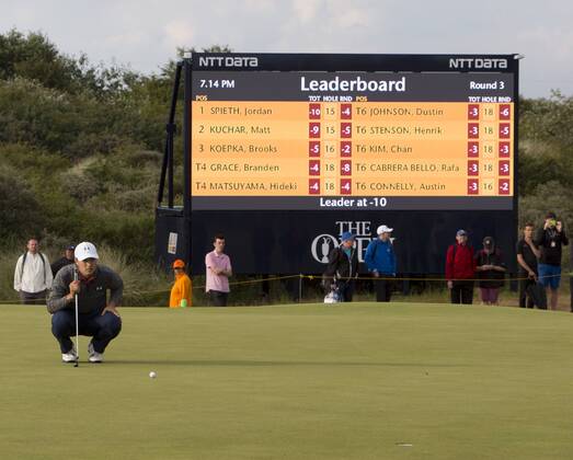 22nd July 2017, Royal Birkdale Golf Club, Southport, England; The 146th Open Golf Championship, third round ; Championship leader Jordan Spieth (USA) looks at the line of his birdie putt on the 16th green in front of the leaderboard xDavidxBlunsdenx  ActionPlus11905219