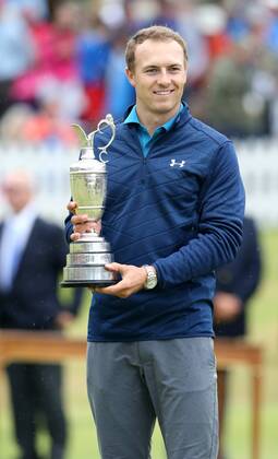 23rd July 2017, Royal Birkdale Golf Club, Southport, England; The 146th Open Golf Championship, fourth round ; Jordan Spieth (USA) smiles as he holds the claret jug trophy as Champion Golfer of the Year xDavidxBlunsdenx  ActionPlus11905787