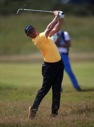 23rd July 2017, Royal Birkdale Golf Club, Southport, England; The 146th Open Golf Championship, fourth round ; Rory McIlroy (NIR) watches the flight of his blind second shot from the rough on the 3rd hole xDavidxBlunsdenx  ActionPlus11905889
