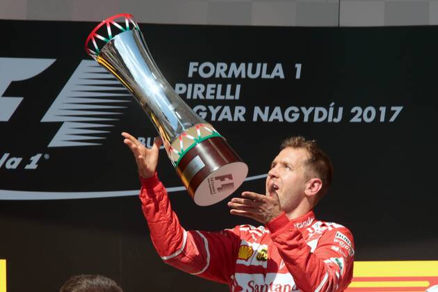 FORMULA 1 - Hungarian GP BUDAPEST,HUNGARY,30.JUL.17 - MOTORSPORTS, FORMULA 1 - Grand Prix of Hungary, Hungaroring. Image shows Sebastian Vettel (GER Ferrari). Keywords: award ceremony, trophy. GEPAxpictures xFritzxMueller