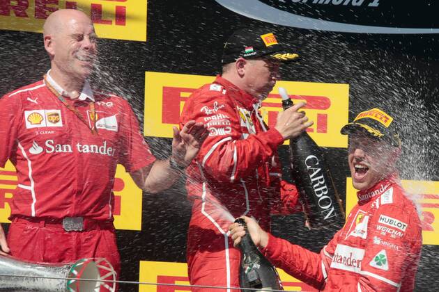 FORMULA 1 - Hungarian GP BUDAPEST,HUNGARY,30.JUL.17 - MOTORSPORTS, FORMULA 1 - Grand Prix of Hungary, Hungaroring. Image shows Jock Clear (Ferrari Engineering Director), Kimi Raikkoenen (FIN Ferrari) and Sebastian Vettel (GER Ferrari). Keywords: award ceremony, champagne shower. GEPAxpictures xFritzxMueller