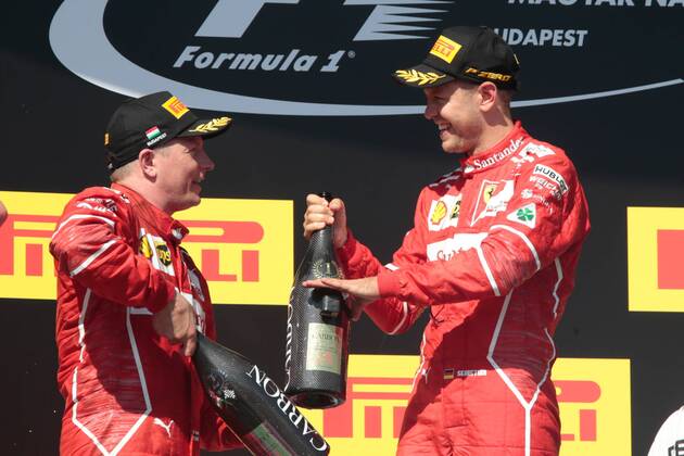 FORMULA 1 - Hungarian GP BUDAPEST,HUNGARY,30.JUL.17 - MOTORSPORTS, FORMULA 1 - Grand Prix of Hungary, Hungaroring. Image shows Kimi Raikkoenen (FIN Ferrari) and Sebastian Vettel (GER Ferrari). Keywords: award ceremony, champagne shower. GEPAxpictures xFritzxMueller