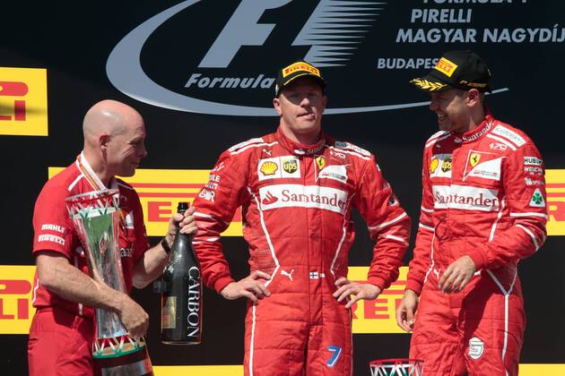 FORMULA 1 - Hungarian GP BUDAPEST,HUNGARY,30.JUL.17 - MOTORSPORTS, FORMULA 1 - Grand Prix of Hungary, Hungaroring. Image shows Jock Clear (Ferrari Engineering Director), Kimi Raikkoenen (FIN Ferrari) and Sebastian Vettel (GER Ferrari). Keywords: award ceremony. GEPAxpictures xFritzxMueller