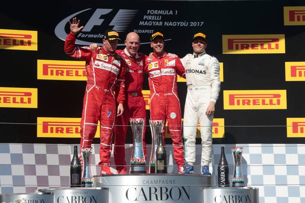 FORMULA 1 - Hungarian GP BUDAPEST,HUNGARY,30.JUL.17 - MOTORSPORTS, FORMULA 1 - Grand Prix of Hungary, Hungaroring. Image shows Kimi Raikkoenen (FIN Ferrari), Jock Clear (Ferrari Engineering Director), Sebastian Vettel (GER Ferrari) and Valtteri Bottas (FIN Mercedes). Keywords: award ceremony. GEPAxpictures xFritzxMueller