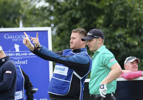 August 10th 2017, Galgorm Castle Golf Club, Galgorm, Northern Ireland; Northern Ireland Open, 1st Round; Scott Henry (SCO) discusses the 1st fairway with his caddy xNigelxCookex  ActionPlus11914081