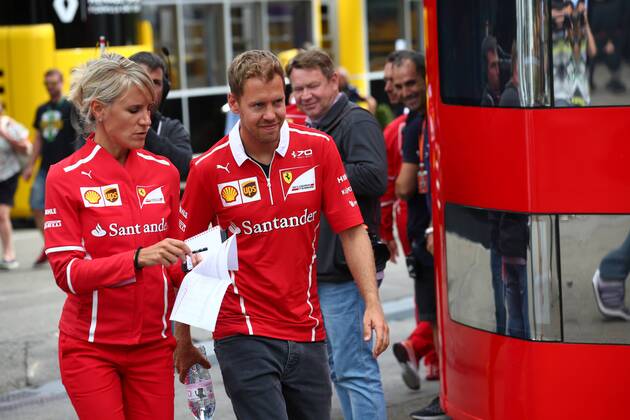 24.08.2017 - Britta Roeske (AUT) Ferrari Press Officer and Sebastian Vettel (GER) Scuderia Ferrari SF70H Belgian Grand Prix, Spa-Francorchamps 24 - 27 August 2017 24.08.2017 - Britta Roeske (AUT) Ferrari Press Officer and Sebastian Vettel (GER) Scuderia Ferrari SF70H 