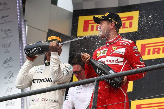 Bilder des Tages - SPORT Lewis Hamilton (Mercedes AMG Petronas Formula One Team) bespritzt Sebastian Vettel (Scuderia Ferrari) mit Champagner, Grosser Preis von Belgien 2017, Rennen, Motorsport, Formel 1, 27.08.2017, Spa Francorchamps Copyright: xEibner-Pressefoto AlexanderxNeisx EP_ANS