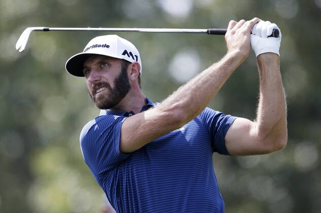 Dustin Johnson hits his tee shot on hole 2 in the final round of The Northern Trust golf championship at the Glen Oaks Club in Old Westbury, New York on August 27, 2017. Glen Oaks Club is hosting THE NORTHERN TRUST for the first time.  NYP20170827110 JOHNxANGELILLO