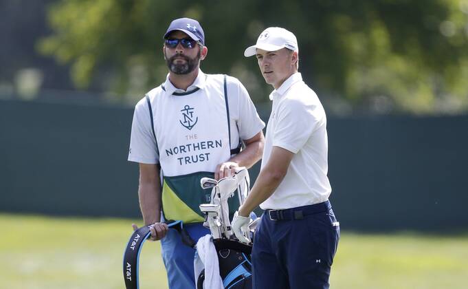 Jordan Spieth and caddie Michael Greller stand on the first hole fairway in the final round of The Northern Trust golf championship at the Glen Oaks Club in Old Westbury, New York on August 27, 2017. Glen Oaks Club is hosting THE NORTHERN TRUST for the first time.  NYP20170827106 JOHNxANGELILLO