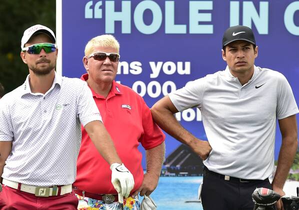 Czech golf player Filip Mruzek, from left, John Daly and Julian Suri of USA pose during the Czech Masters European Tour tournament in Vysoky Ujezd near Prague, Czech Republic, August 31, 2017. (CTKxPhoto RomanxVondrous) CTKPhotoP201708310890101  vnd 9