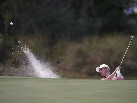 Justin Thomas of the United States hits a shot from the bunker on the 13th hole on day two of the Presidents Cup on September 29, 2017 at Liberty National Golf Club in Jersey City, New Jersey.  NYP20170929506 RICHxSCHULTZ