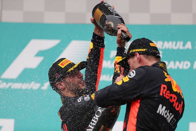 01.10.2017 - Race, 3rd place Daniel Ricciardo (AUS) Red Bull Racing RB13 and Max Verstappen (NED) Red Bull Racing RB13 race winner Malaysian Grand Prix, Sepang 28 September - 1 October 2017 01.10.2017 - Race, 3rd place Daniel Ricciardo (AUS) Red Bull Racing RB13 and Max Verstappen (NED) Red Bull Racing RB13 race winner