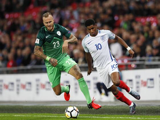England s Marcus Rashford tussles with Slovenia s Aljaz Struna during the world cup qualifying match at Wembley Stadium, London. Picture date 5th October 2017. Picture credit should read: David Klein Sportimage EDITORIAL USE ONLY. No use with unauthorised audio, video, data, fixture lists, club league logos or live services. Online in-match use limited to 120 images, no video emulation. No use in betting, games or single club league player publications.