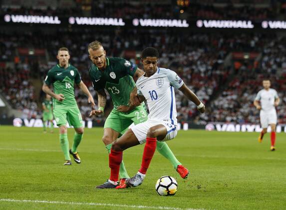 England s Marcus Rashford tussles with Slovenia s Aljaz Struna during the world cup qualifying match at Wembley Stadium, London. Picture date 5th October 2017. Picture credit should read: David Klein Sportimage EDITORIAL USE ONLY. No use with unauthorised audio, video, data, fixture lists, club league logos or live services. Online in-match use limited to 120 images, no video emulation. No use in betting, games or single club league player publications.