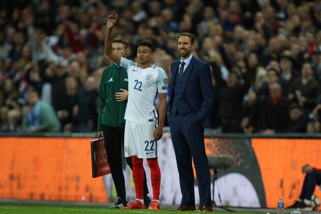 Gareth Southgate manager of England prepares to put Jesse Lingard of England on as a substitute at the England v Slovenia FIFA World Cup WM Weltmeisterschaft Fussball Qualifier 2018 match at Wembley Stadium, London, on October 5, 2017. 