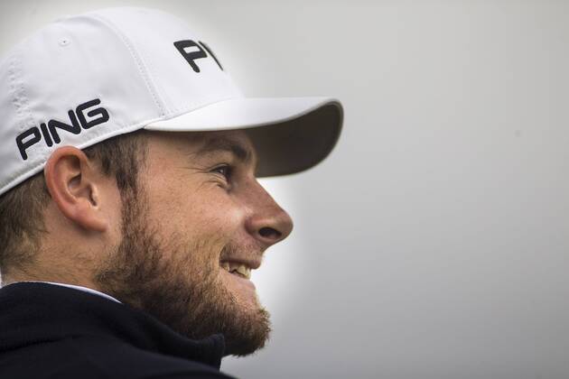 8th October 2017, Old Course, St Andrews, Scotland; Alfred Dunhill Links Championship, final round; Tyrrell Hatton on the 16th green reflects on his lead  ActionPlus11939283