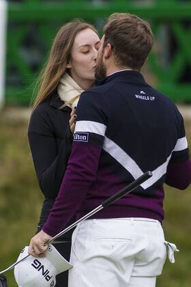 8th October 2017, Old Course, St Andrews, Scotland; Alfred Dunhill Links Championship, final round; Tyrrell Hatton Emily Breisher on the 18th green as she congratualates him on win and -24 card  ActionPlus11939291