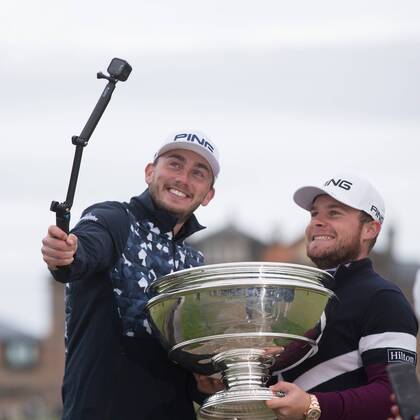 8th October 2017, Old Course, St Andrews, Scotland; Alfred Dunhill Links Championship, final round; England& x2019;s Tyrrell Hatton and caddie Johnathon Bell take a selfie with the Alfred Dunhill Links trophy after his -24 carded win on the Old Course, St Andrews  ActionPlus11939304