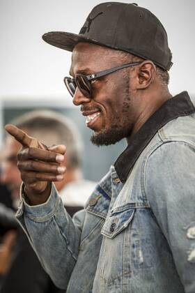 AUSTIN, TX - OCTOBER 22: Usain Bolt jokes with reporter prior to the Formula 1 United States Grand Prix on October 22, 2017, at the Circuit of the Americas in Austin, TX. (Photo by John Crouch Icon Sportswire) AUTO: OCT 22 F1 - United States Grand Prix Icon17102202591 EDITORIAL USE ONLY