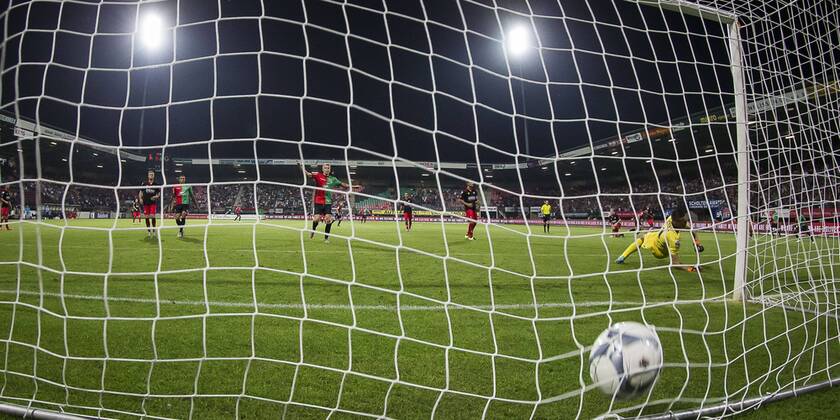 Nijmegen NEC Excelsior Football Eredivsie season 2015 2016 12 08 2015 Stadium the Goffert NEC player Navarone Foor has the 1 0 scored Excelsior keeper Filip Kurto R is no chance NEC player Kristjan Emilsson M cheered NEC Excelsior