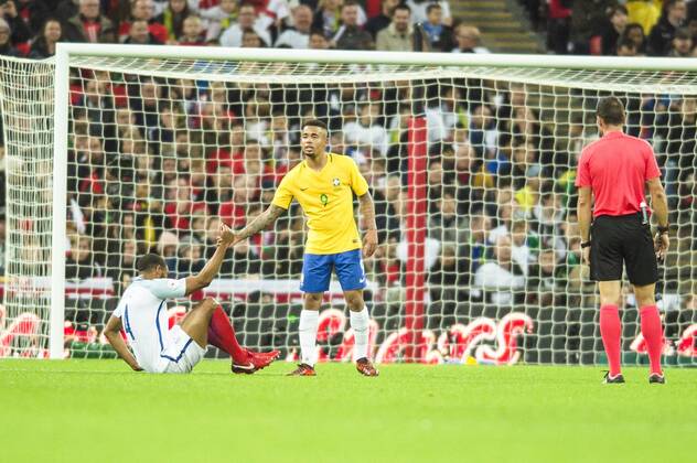 Gabriel Jesus of Brazil picks up Joe Gomez of England after fouling him during the International Friendly Länderspiel match between England and Brazil at Wembley Stadium, London, England on 14 November 2017. Copyright: xDarrenxMusgrovex 17720090