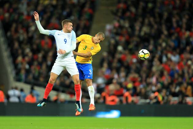 14th November 2017, Wembley Stadium, London, England; International football friendly, England versus Brazil; Miranda of Brazil battles to win a header against Jamie Vardy of England  ActionPlus11951525