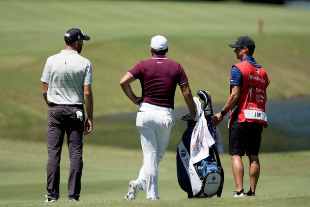 SYDNEY, AUSTRALIA - NOVEMBER 23: Jason Day (AUS) and Geoff Ogilvy (AUS) wait for the green to clear at Round 1 of the 102nd Australian Open Golf Championship on November 23, 2017 at The Australian Golf Club in Sydney, Australia. (Photo by Steven Markham Icon Sportswire) GOLF: NOV 23 The Emirates Australian Open Golf Championship - First Round Icon1711230219 EDITORIAL USE ONLY