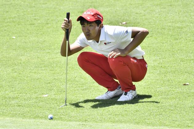 26th November 2017, The Australian Golf Club, Sydney, Australia; Emirates Australian Open Golf, final round; amateur Takumi Kanaya (JAP) inspects his line on the green  ActionPlus11956415