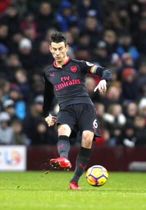 FuÃŸball, England, LGBT Kampagne 26th November 2017, Turf Moor, Burnley, England; EPL Premier League football, Burnley versus Arsenal; Laurent Koscielny Captain of Arsenal with the LGBT armband passes the ball  ActionPlus11956713