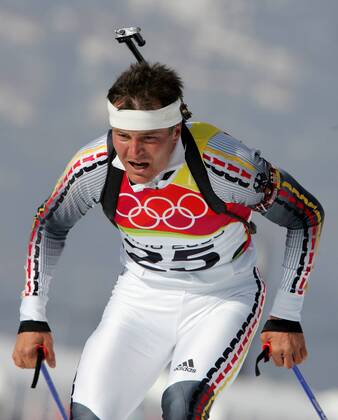 Sven Fischer wins gold in biathlon Sprint 10 km action San Sicario, Italy