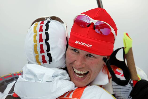 Biathlon women s relay silver medal Olympic Games 2006 recorded in San Sicario on 23 02 2006 Kati Wilhelm, Martina Galgow embraces San Sicario, Italy